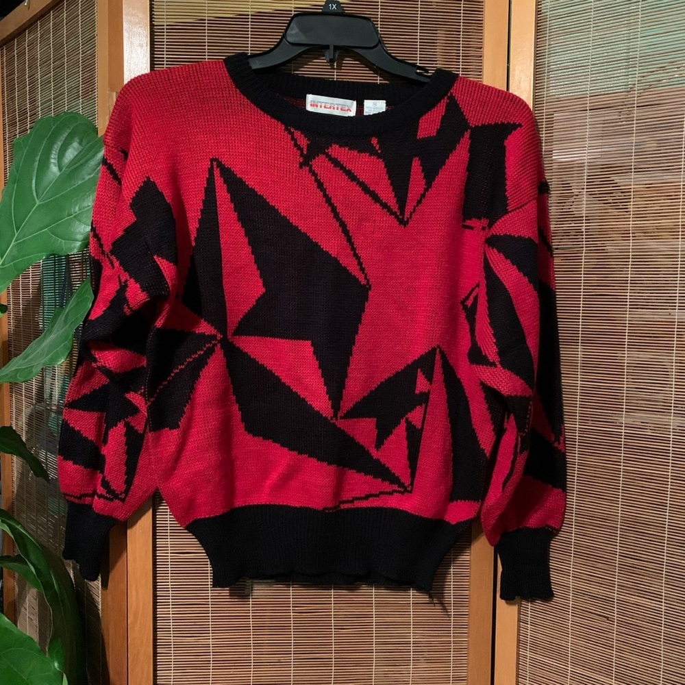 Medium vintage Ed and black geometric sweater. Fits more like a S/M
